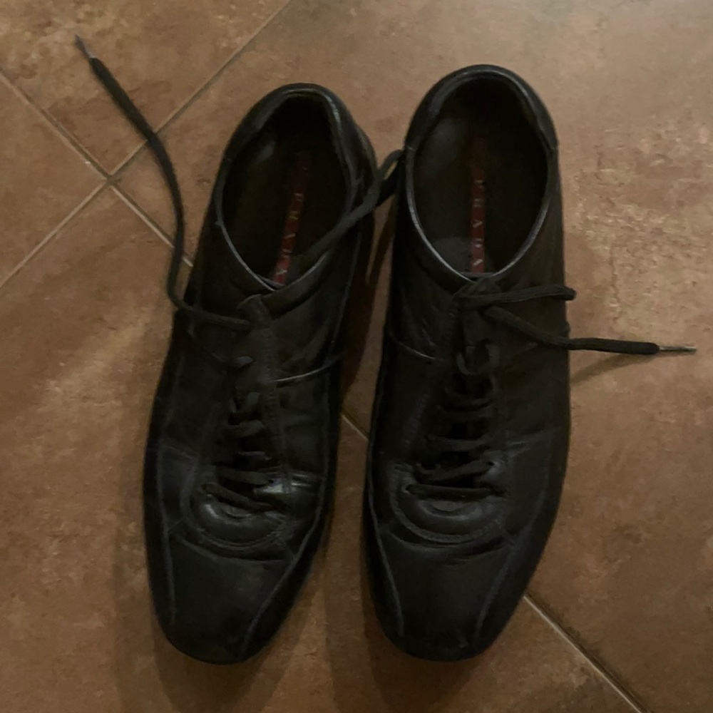 Prada all black leather sneakers